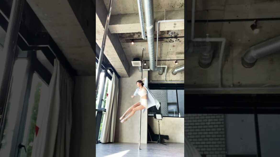 ポールダンスする熊田曜子
